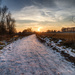 Sunset over ice covered path by leonbuys83