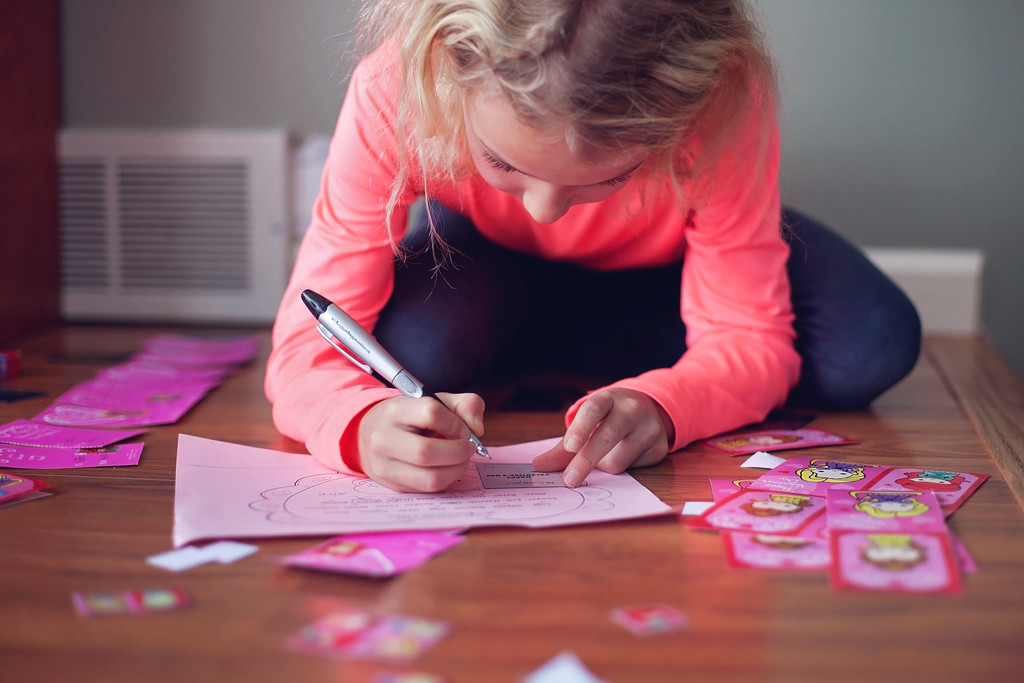 Writing Valentines cards by kiwichick
