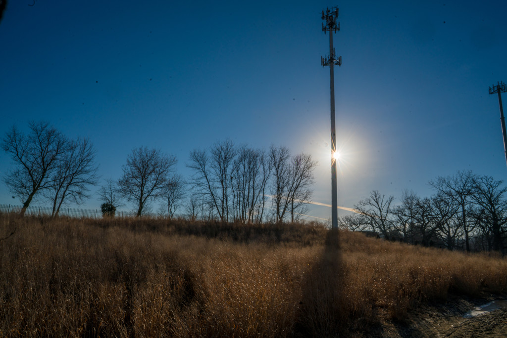 Sunburst Behind a Cell Tower by rminer