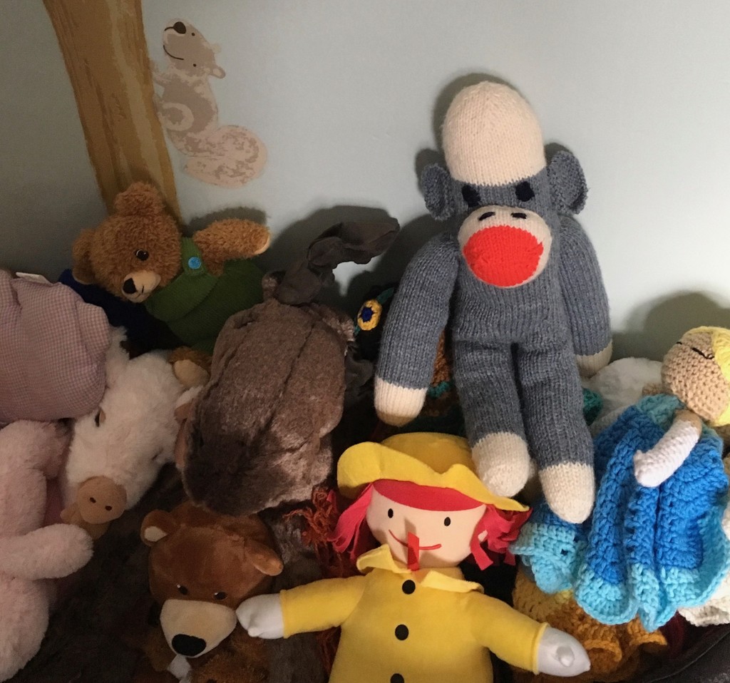 Bryon the sock monkey is king of the pile by corktownmum