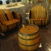 Sitting on wine barrels by ludwigsdiana