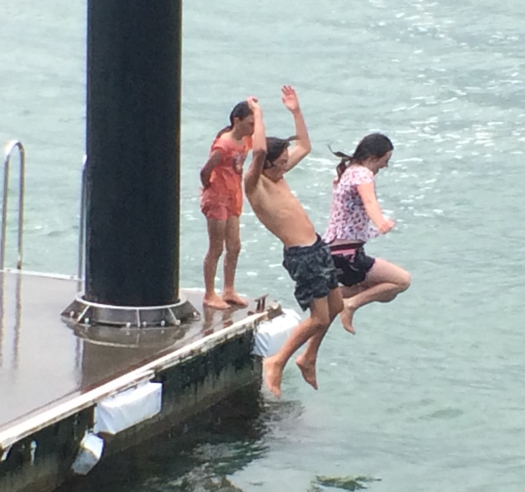 Kids having fun taken at Opononi wharf  by Dawn