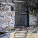 12th Century steps leading to modern gate by frequentframes
