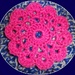 Pink crocheted coaster. by grace55