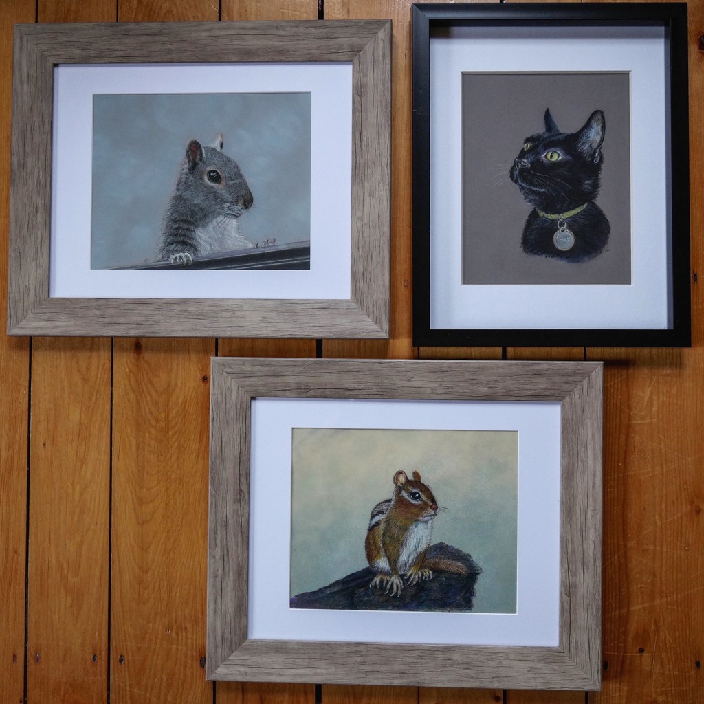 Three old friends in frames on the floor by berelaxed