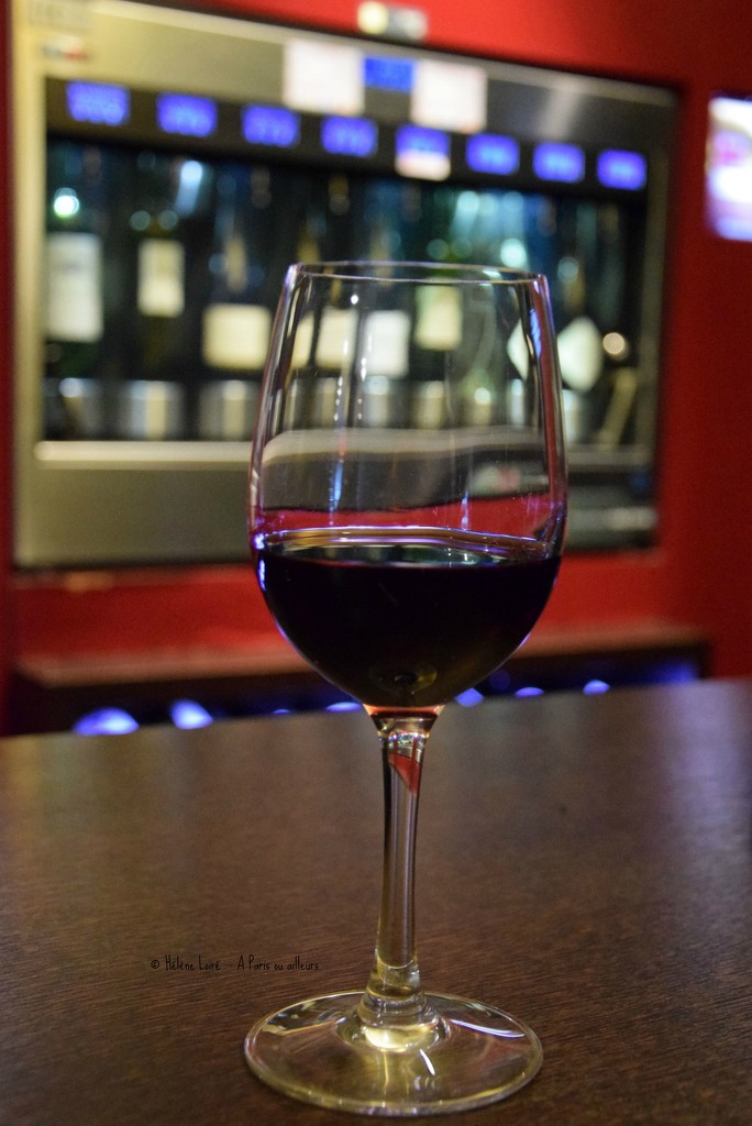 a glass of wine by parisouailleurs