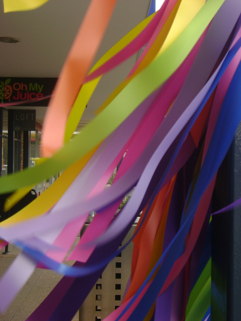 Streamers outside shop by marguerita
