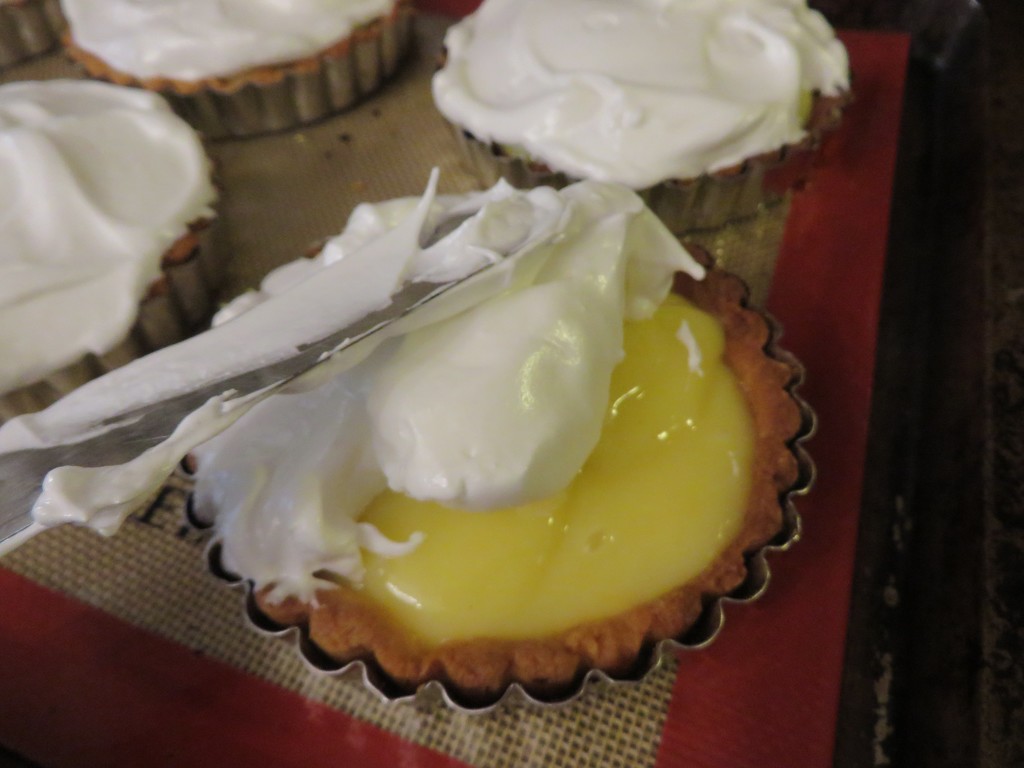 Making Lemon Meringue Tarts by margonaut