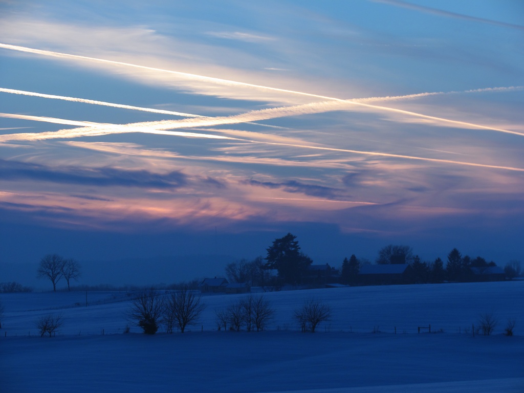 Jet trails sunset by juletee