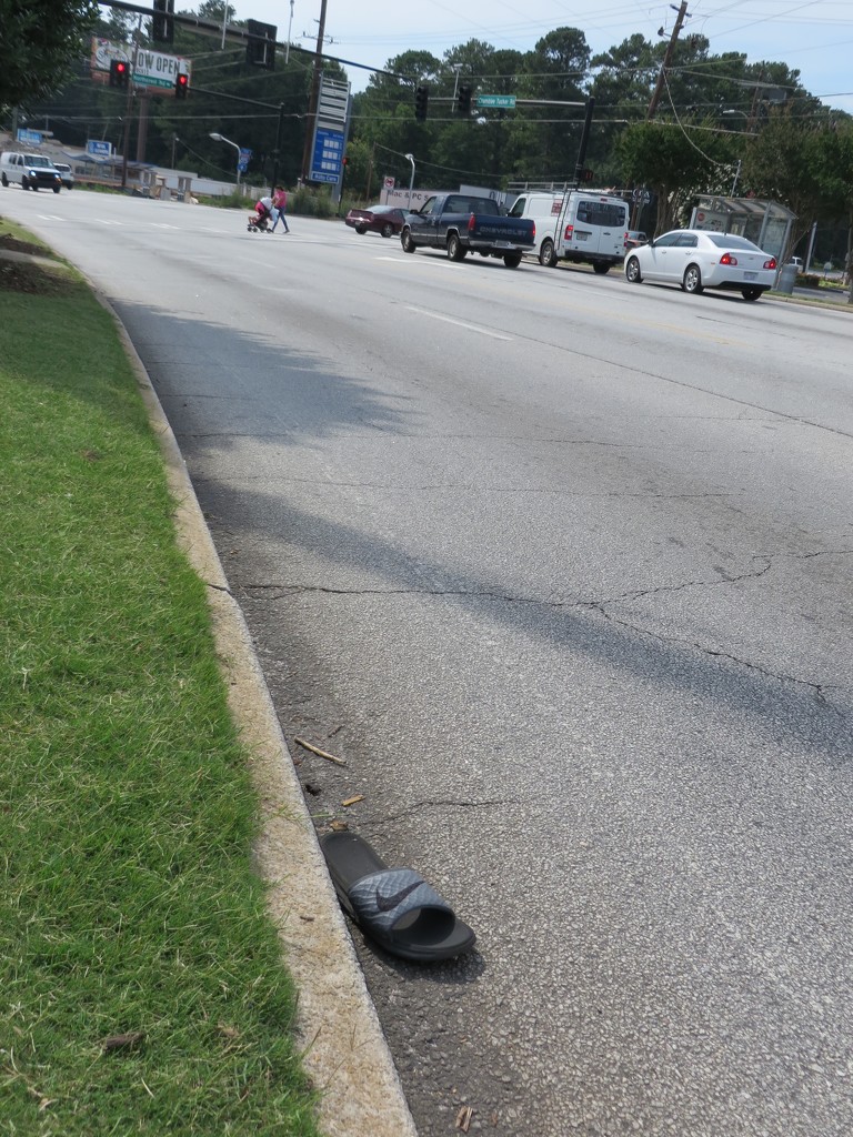 Summer shoe in the road by margonaut