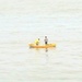 Yellow man, yellow boat by amrita21