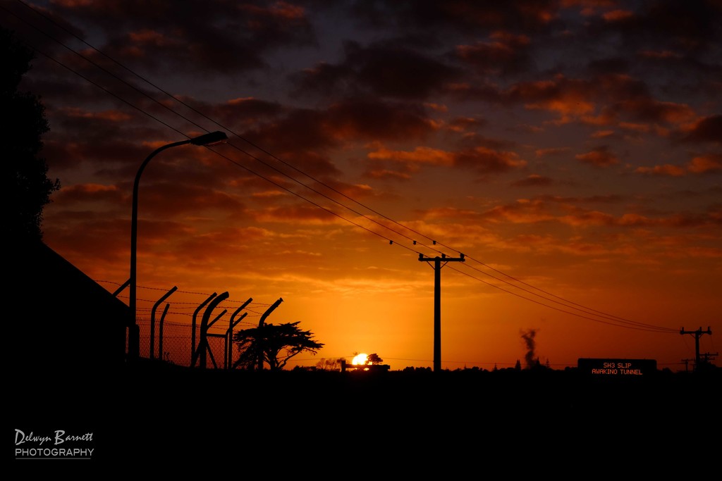 Sunrise with power poles by dkbarnett