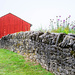 Red barn and rock wall by cindymc
