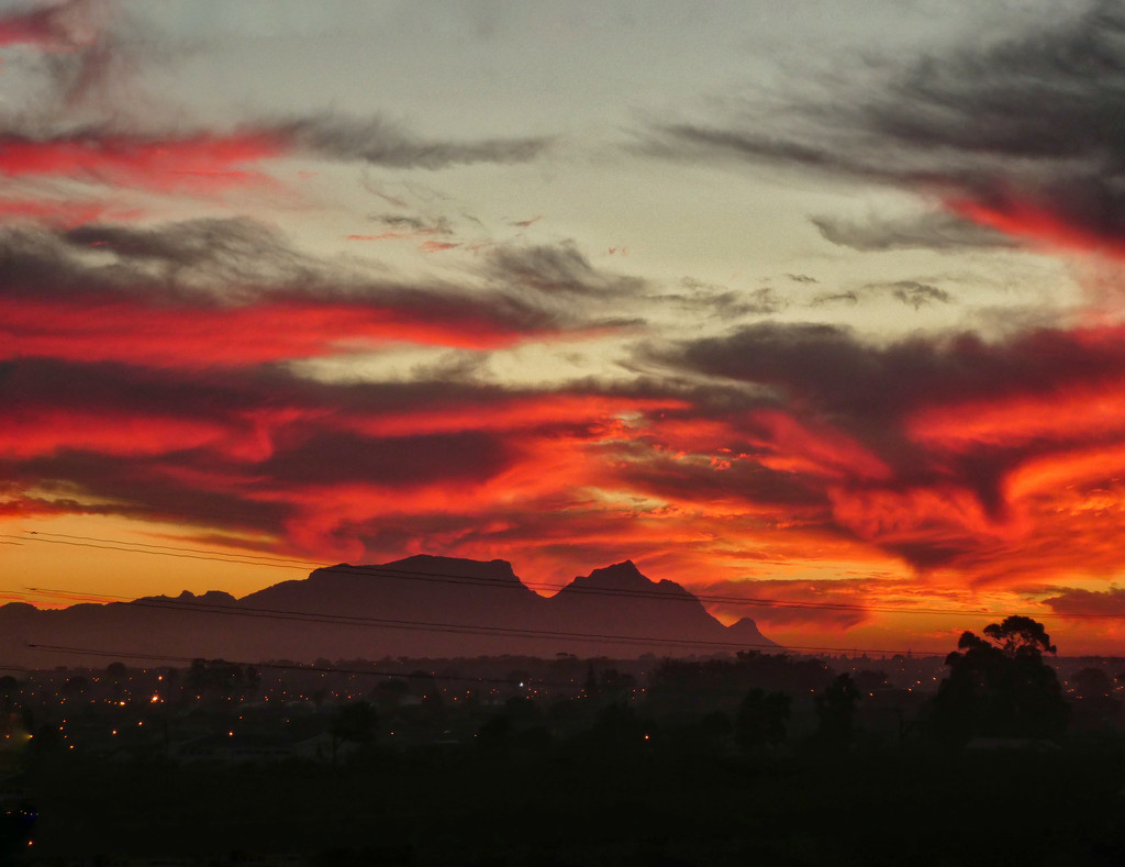 Fire in the sky over Table Mountain....... by ludwigsdiana