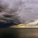 Storm clouds over the lake by jayberg