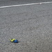 Baby sandal in the road by margonaut