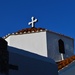 Church in Lindos under a blue sky by caterina