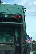 27th Jun 2017 - garbage truck with pinwheel + flag