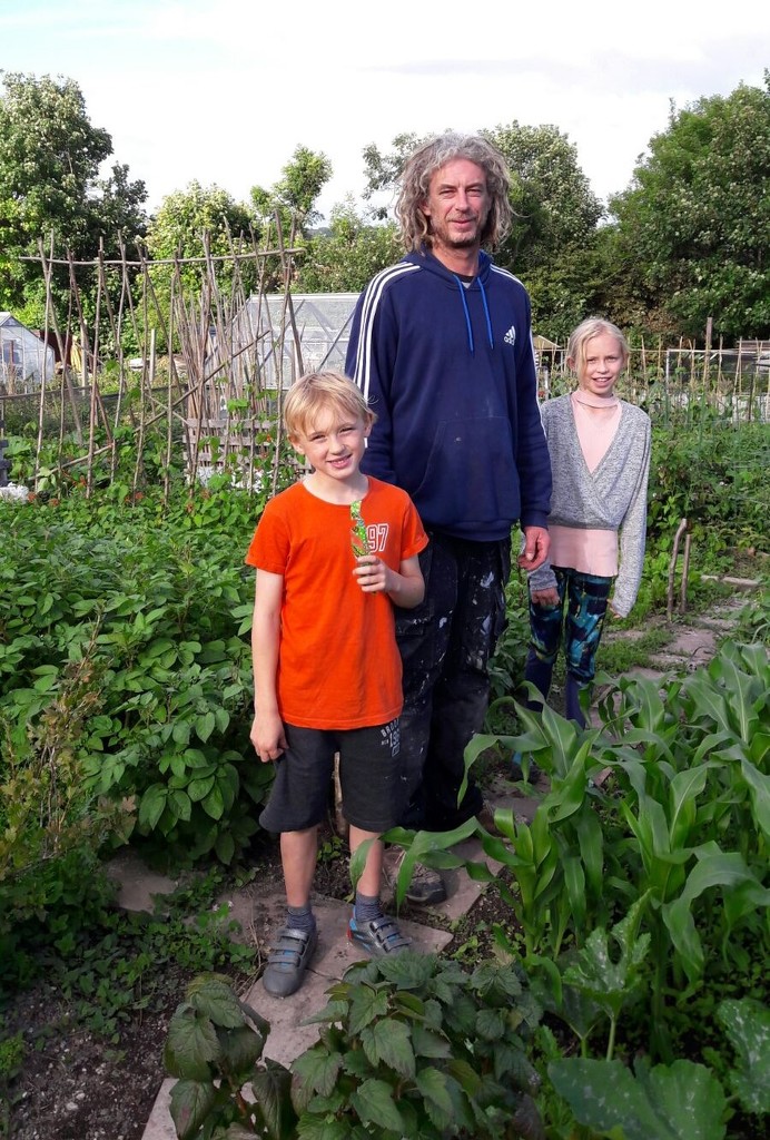 Paul with Emily and Oscar at  the Allotment  by susiemc