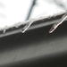 Close-up of Icicles on Roof by sfeldphotos