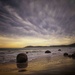 Storm coming over Moeraki Boulders New Zealand by maureenpp