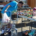 man on bike at flea market by stillmoments33