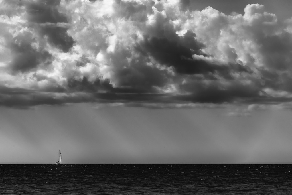 Alone at Sea Under the Clouds by taffy