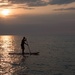 Paddle boarding at sunset by tracymeurs