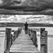 Man on the pier by frequentframes
