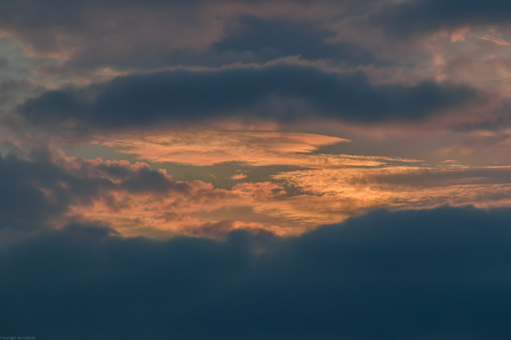 Moody sky through window by jon_lip