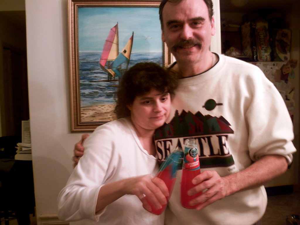 Mom and Dad with new year's drinks 1-1-11 by sfeldphotos