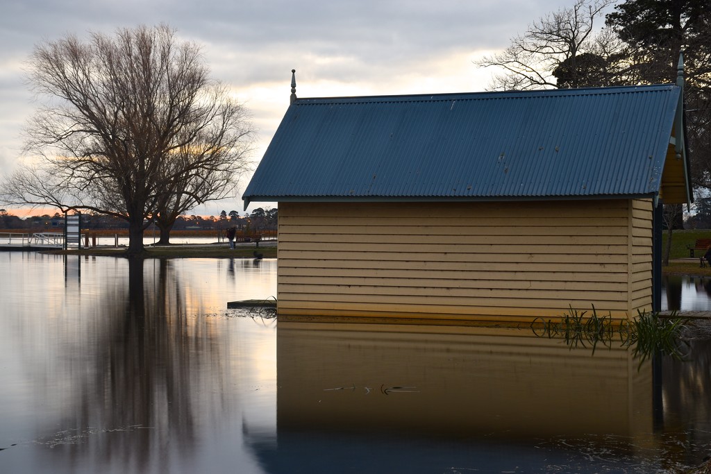 Boatshed setting sun by teodw