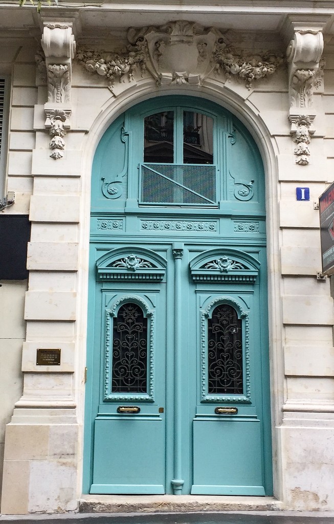 Turquoise door and heart.  by cocobella
