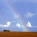 Blue sky rainbow by julienne1