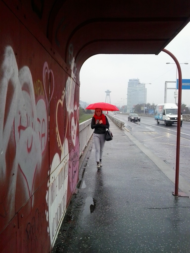 Girl with an red umbrella by ivm