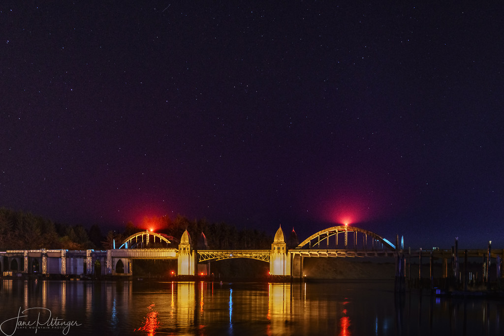 Siuslaw River Bridge At Night by jgpittenger