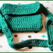 A crocheted green acrylic bag and a pair of handwarmers. by grace55