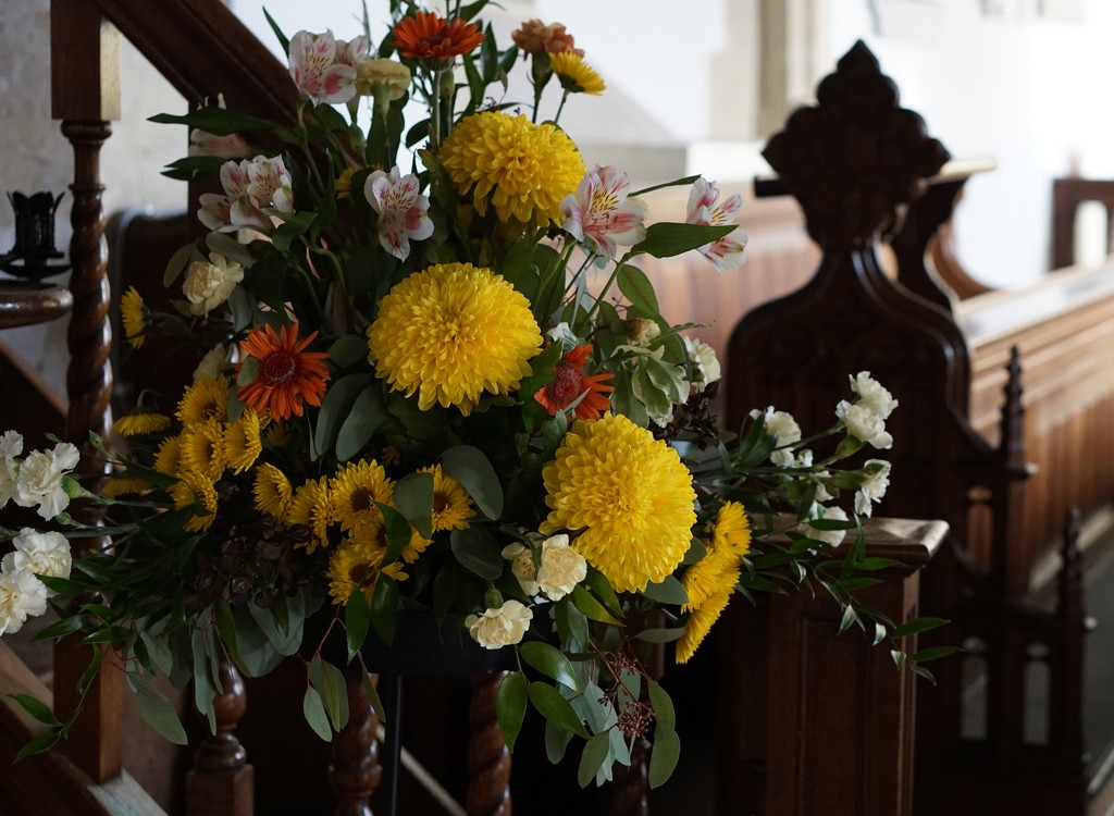 flowers in the church  by quietpurplehaze