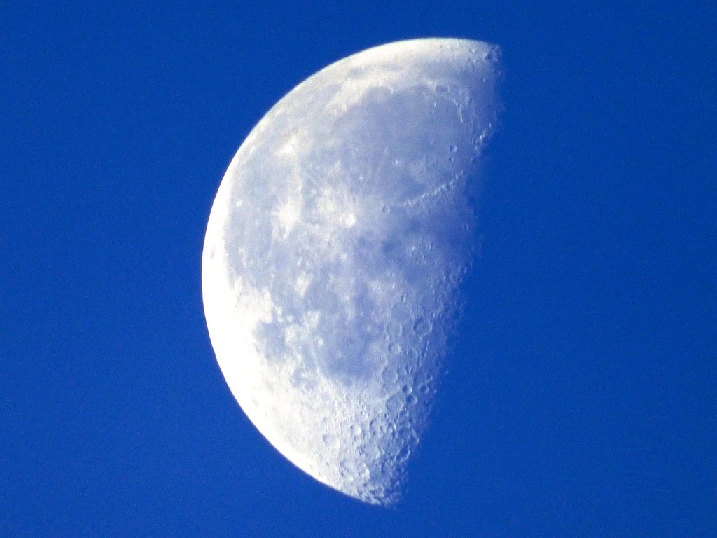 Moon in a blue sky by julienne1