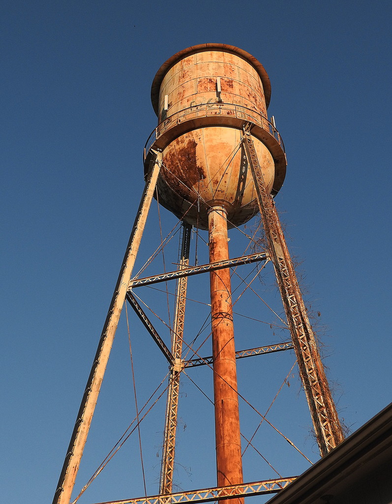 Water tower at sunset by homeschoolmom