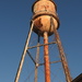 Water tower at sunset by homeschoolmom