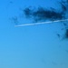 Jet streaming across the sky by kiwinanna