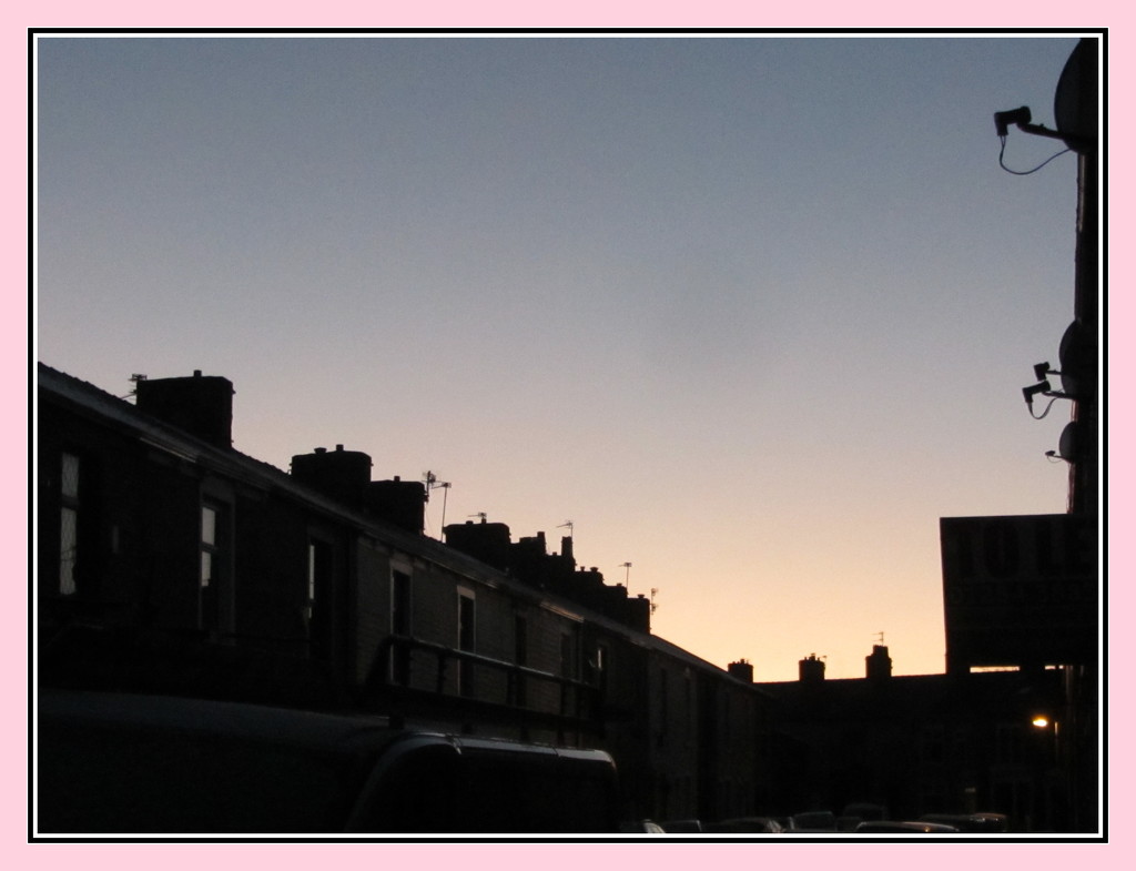 Evening sky and terraced houses. by grace55