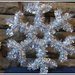Silver tinsel snowflake. by grace55