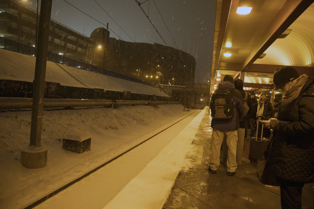 Waiting for the train in the snow by hjbenson