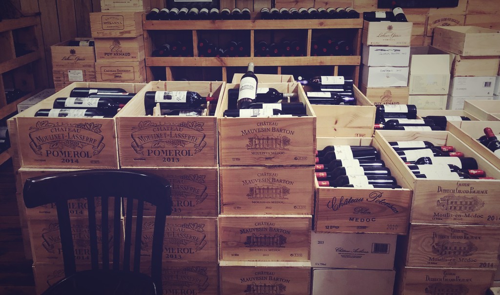 Wine boxes and a chair  by brigette