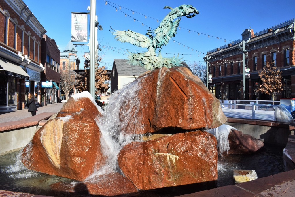Icy fountain in Old Town Square by sandlily