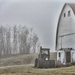 Tractor waits for work at Braun farm by ggshearron