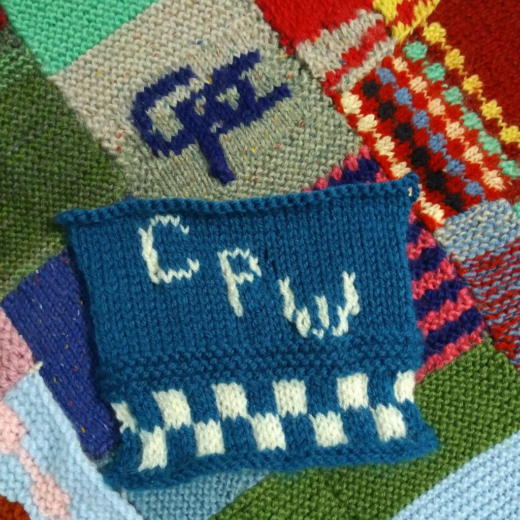 Knitted squares - my initials then, when I started the blanket, and now. by cpw