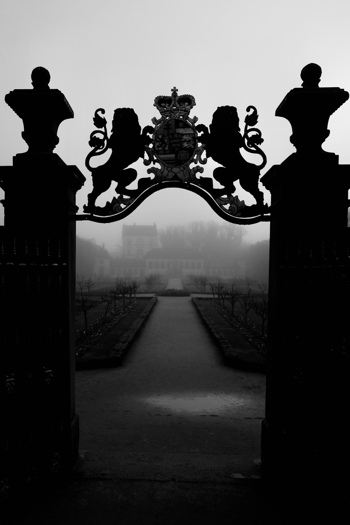 Door on foggy garden by vincent24